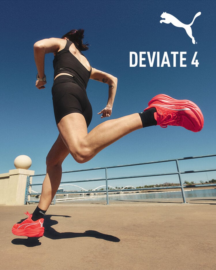 Ragazza che corre con scarpe da running Puma Deviate Nitro 4