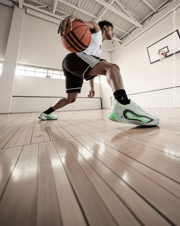 Ragazzo che gioca a basket indoor